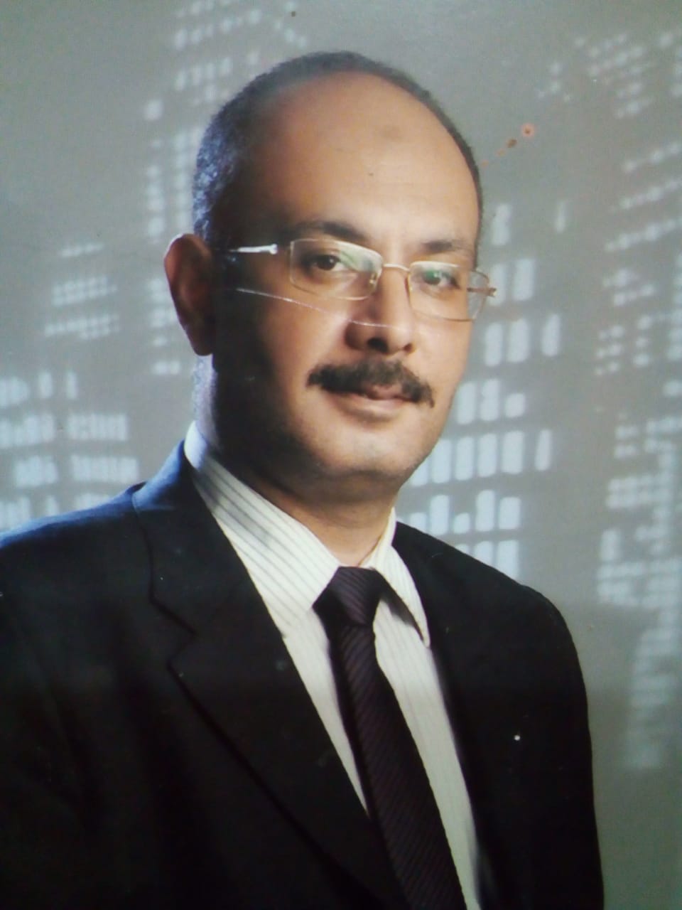  الأستاذ / ياسر محمد سيد أحمد فرج  